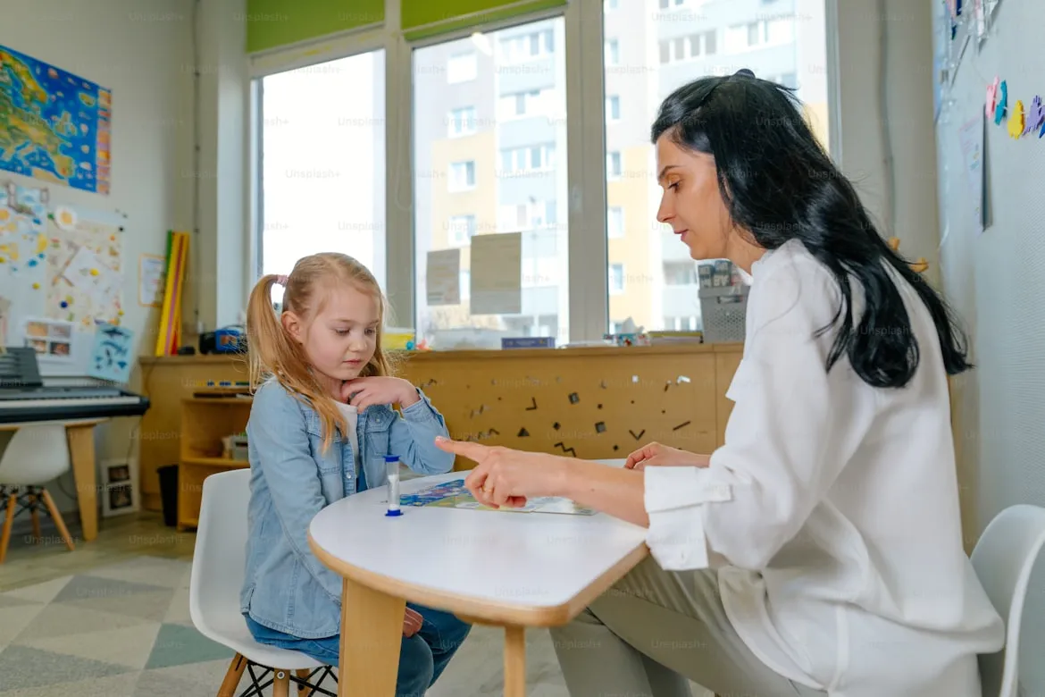doctor and child working on speech exercises