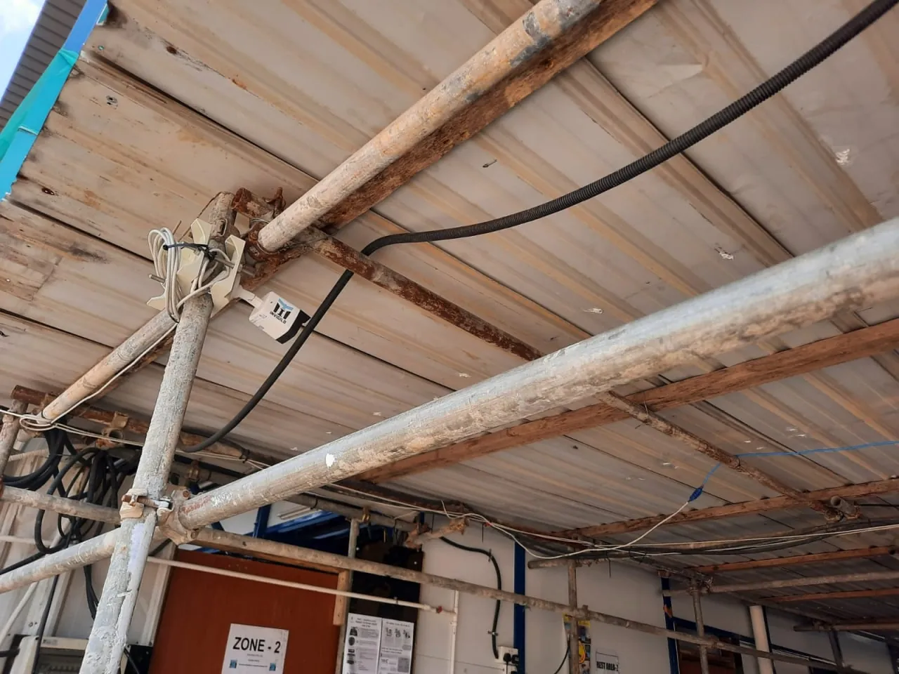 Invigilo SafeKey camera mounted on scaffolding at a Singapore construction site