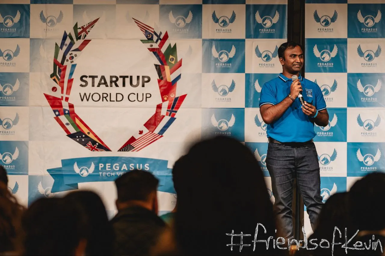Vishnu Saran pitching on the Startup World Cup 2025 Grand Finale stage in San Francisco
