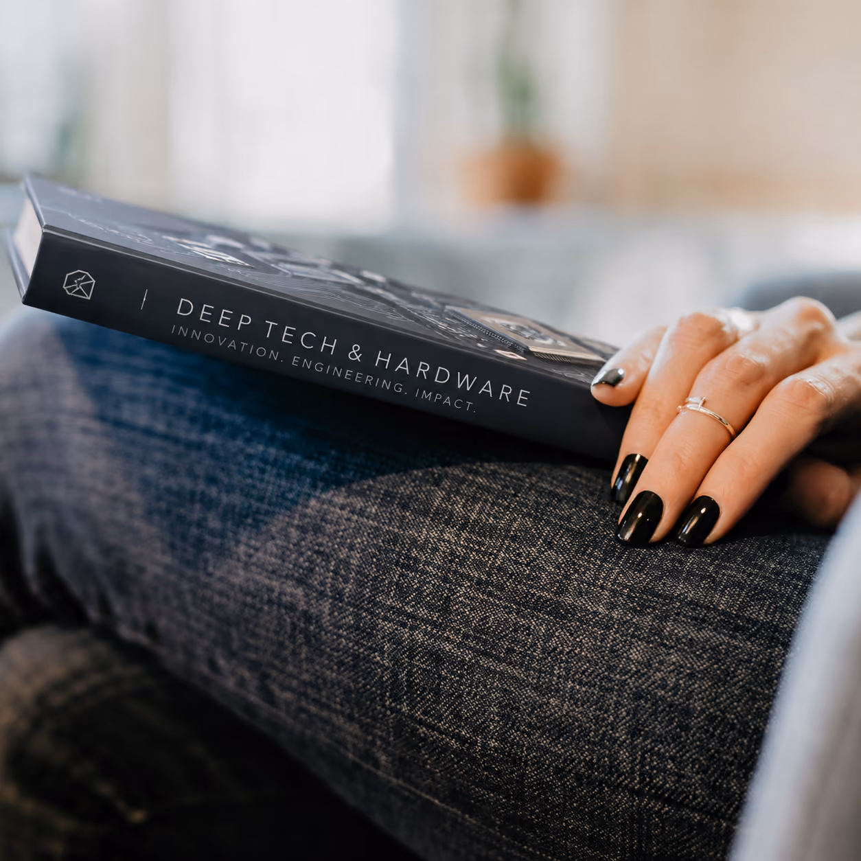 Close-up of deep tech and hardware book highlighting engineering innovation and advanced technology insights.