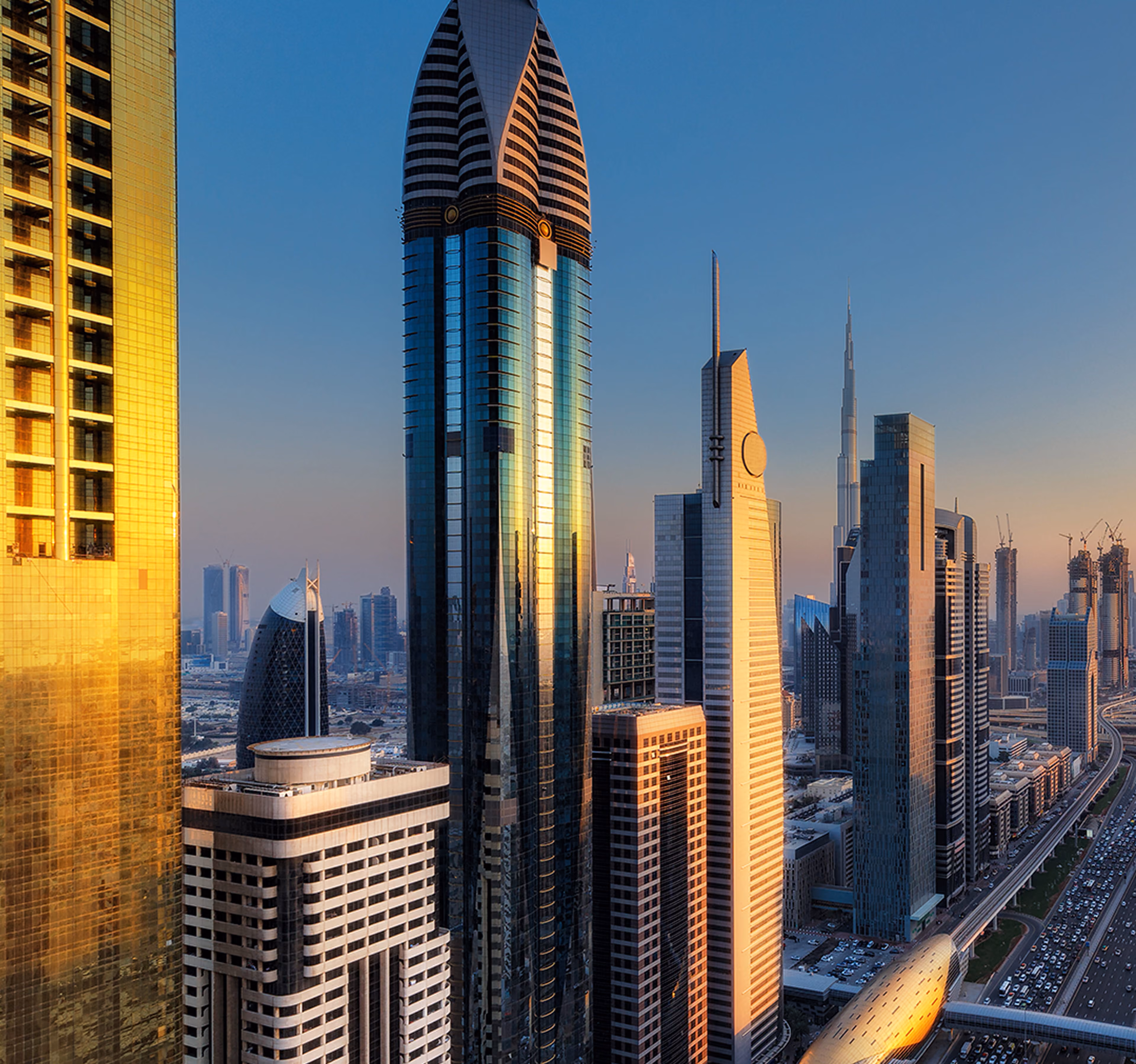  Dubai city skyline with modern skyscrapers at sunset, representing private equity and finance