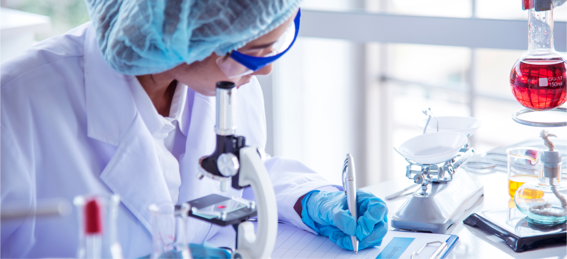 Lab scientist examining a sample, representing pharmaceutical research and drug development pipeline deck now.
