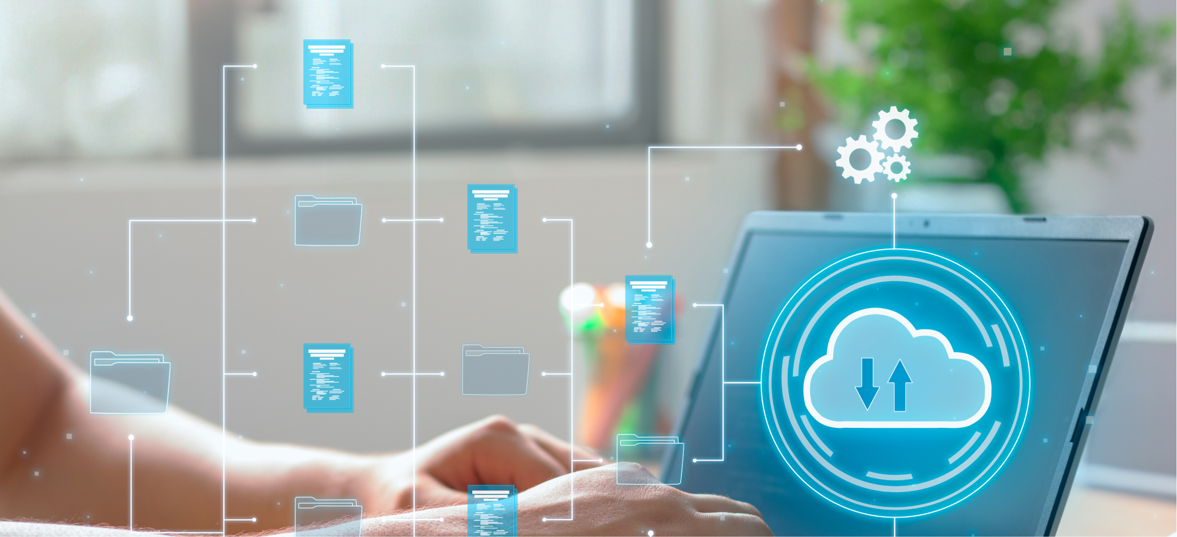 Person typing on a laptop overlaid with digital icons of files, folders, gears, and a glowing cloud symbol.