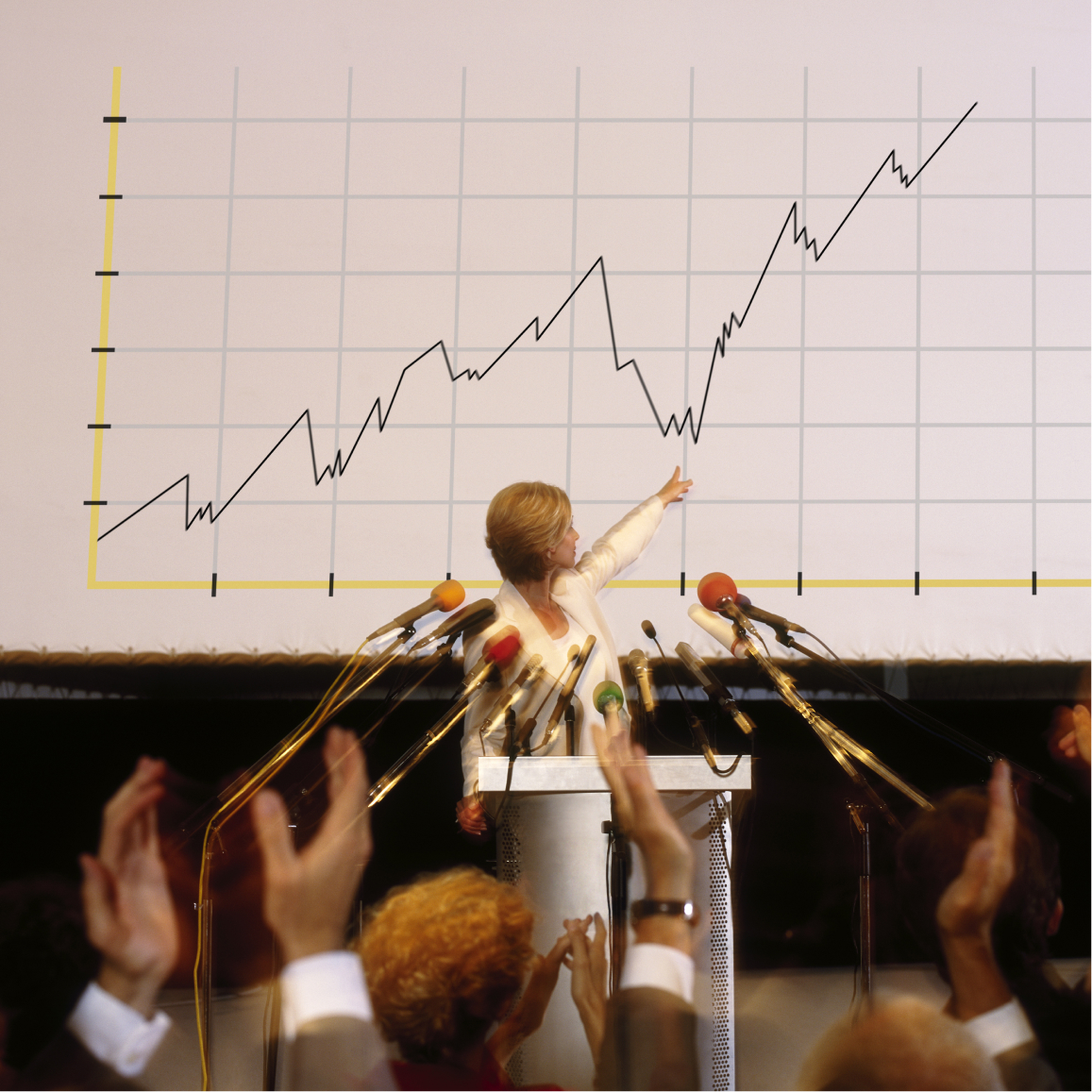 Presenter explaining cybersecurity growth strategy using performance charts during executive presentation meet