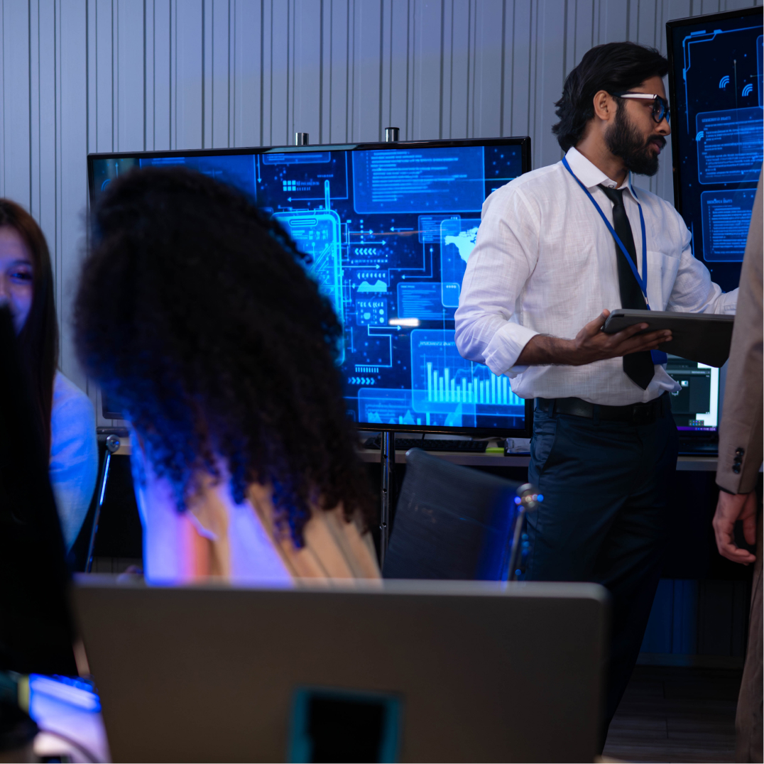 Cybersecurity team presenting board level cyber risk insights with secure data dashboards and executive briefi