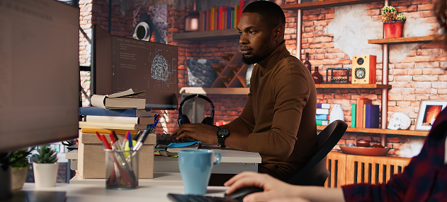Toronto business presentation design showing a professional using technology during a focused business project