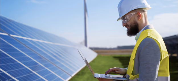 Energy expert reviewing solar panels for renewable energy presentation for Dubai business and investment teams