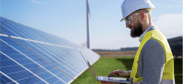 Energy expert reviewing solar panels for renewable energy presentation for Dubai business and investment teams
