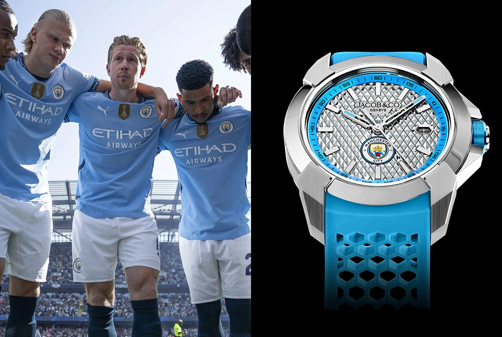 Four Manchester City soccer players in light blue jerseys with Etihad Airways logos and gold FIFA badges stand together with arms around shoulders in a stadium, next to an image of a silver and blue Jacob & Co watch featuring the Manchester City crest on its silver patterned dial and a blue perforated strap.