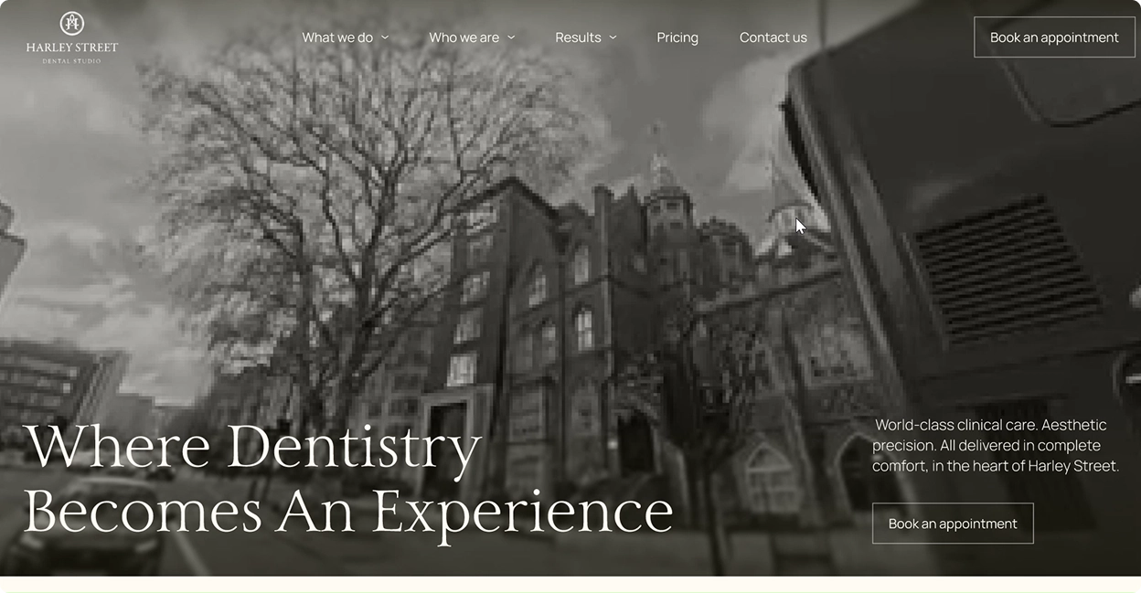 Black and white photo of a historic multi-story building with a large leafless tree in front, featuring text about Harley Street Dental Studio's dentistry services and options to book an appointment.
