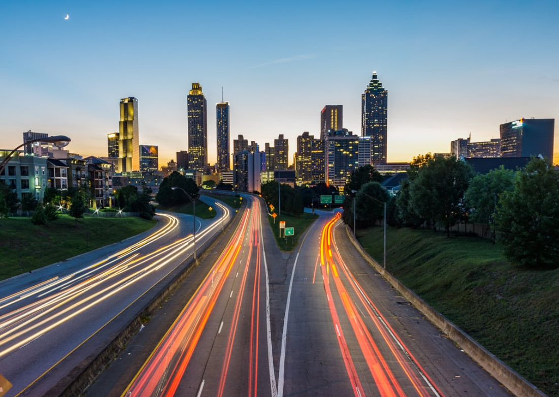 Atlanta skyline at dusk with light-trail highways