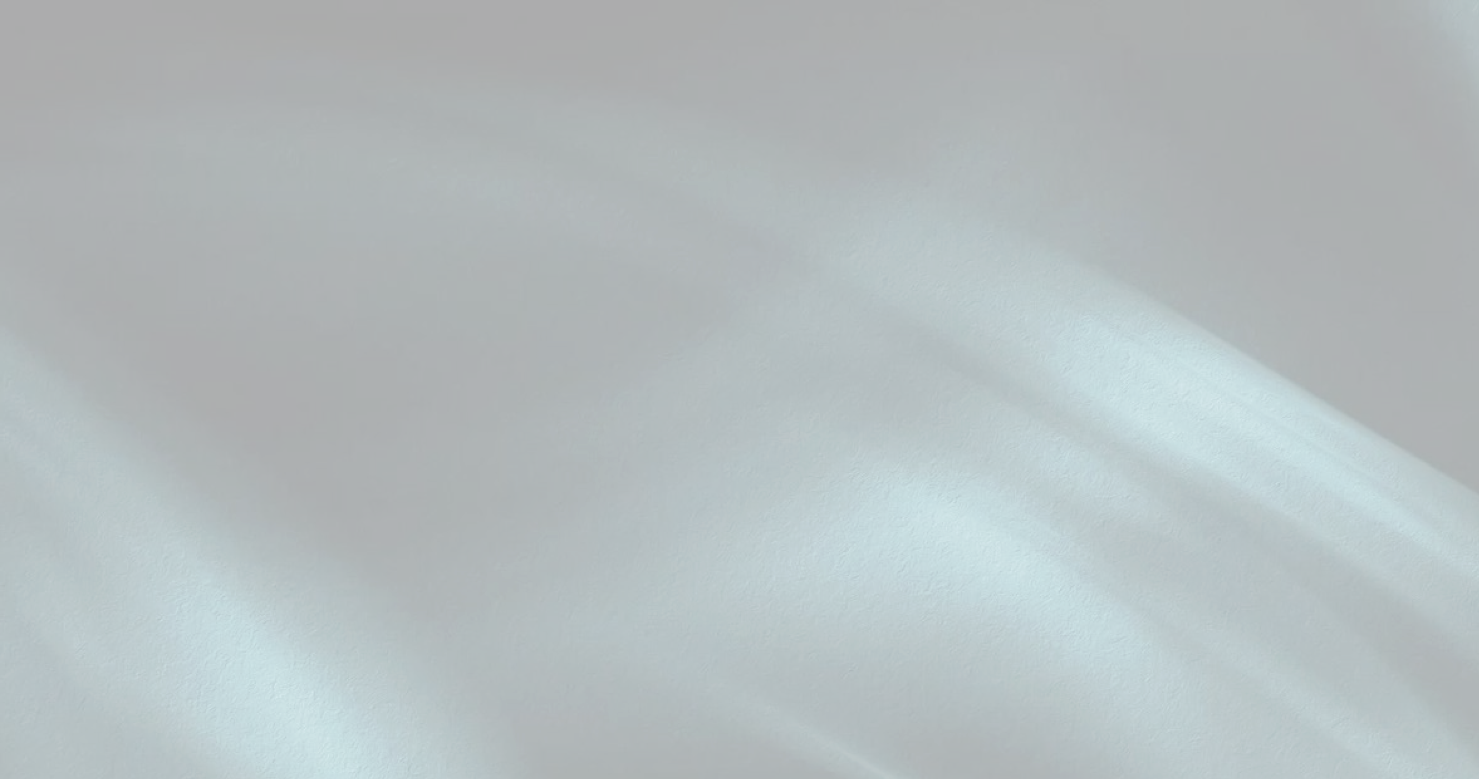 Abstract dark blue and black light waves creating soft flowing texture effect.