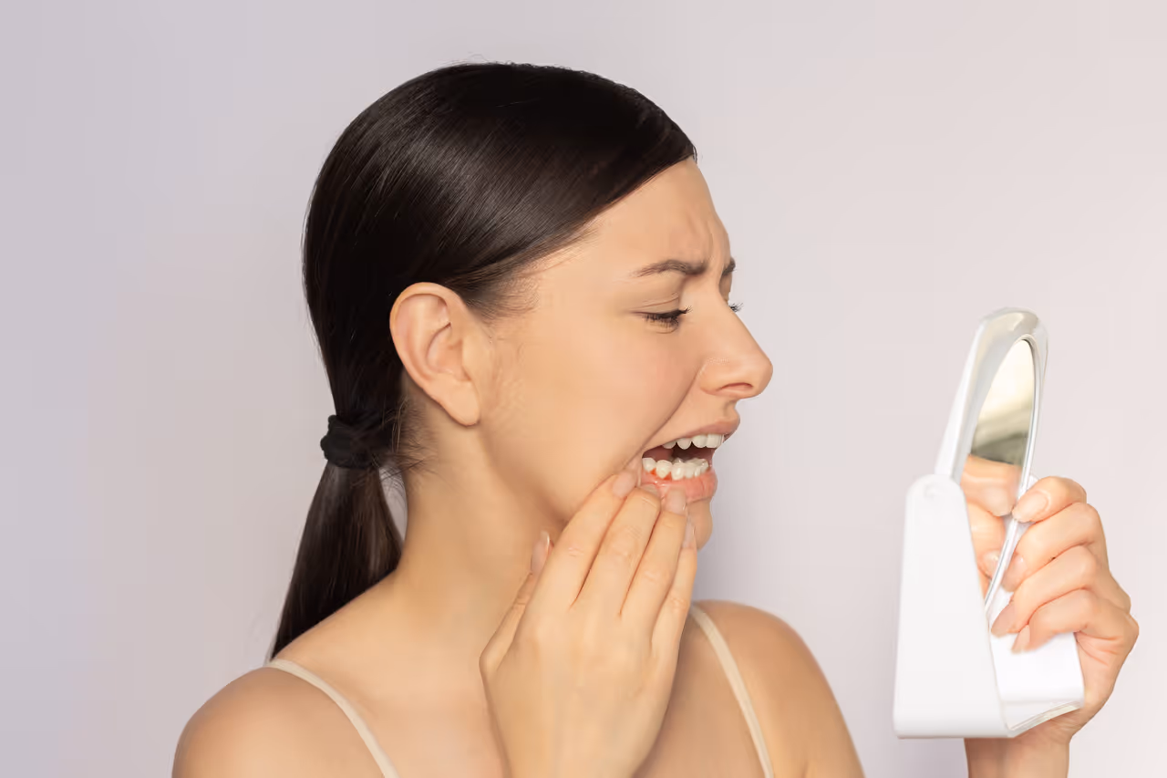 Why Are My Gums Swollen Around One Tooth in the Back?