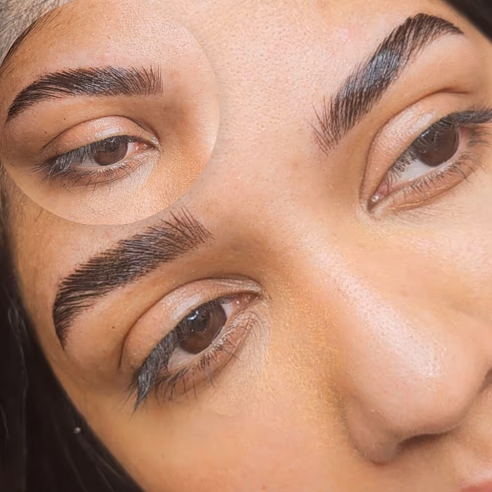 Close-up of a face with neatly groomed, fuller, and shaped eyebrows after brow lamination treatment.