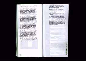 Open book with two pages of printed text in paragraphs on a white background.