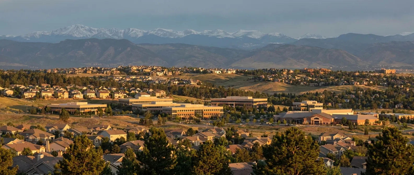 Highlands Ranch, Colorado homes with open space and the Rockies beyond