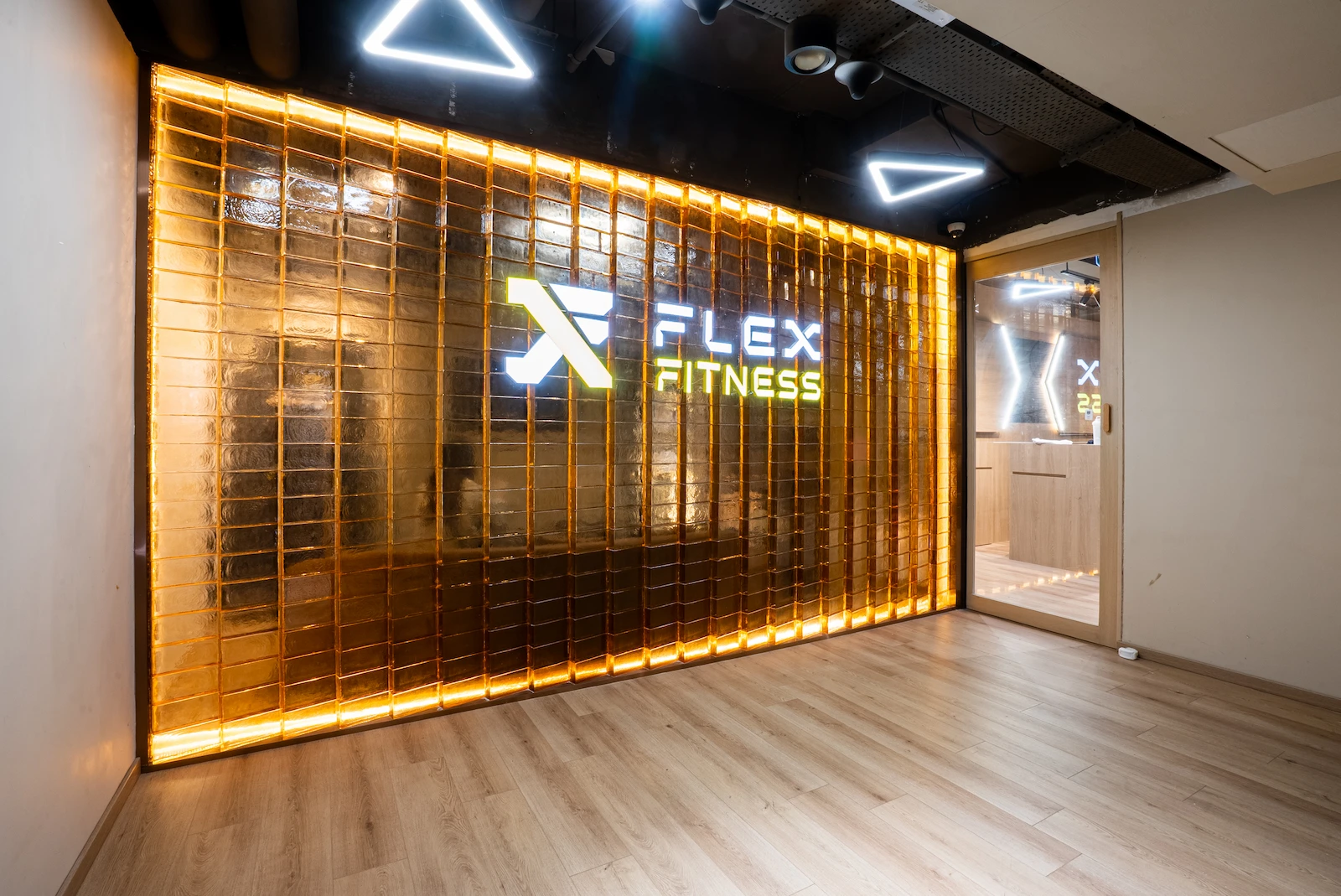 Modern gym interior at Flex Fitness Ocean Mall, Macau.