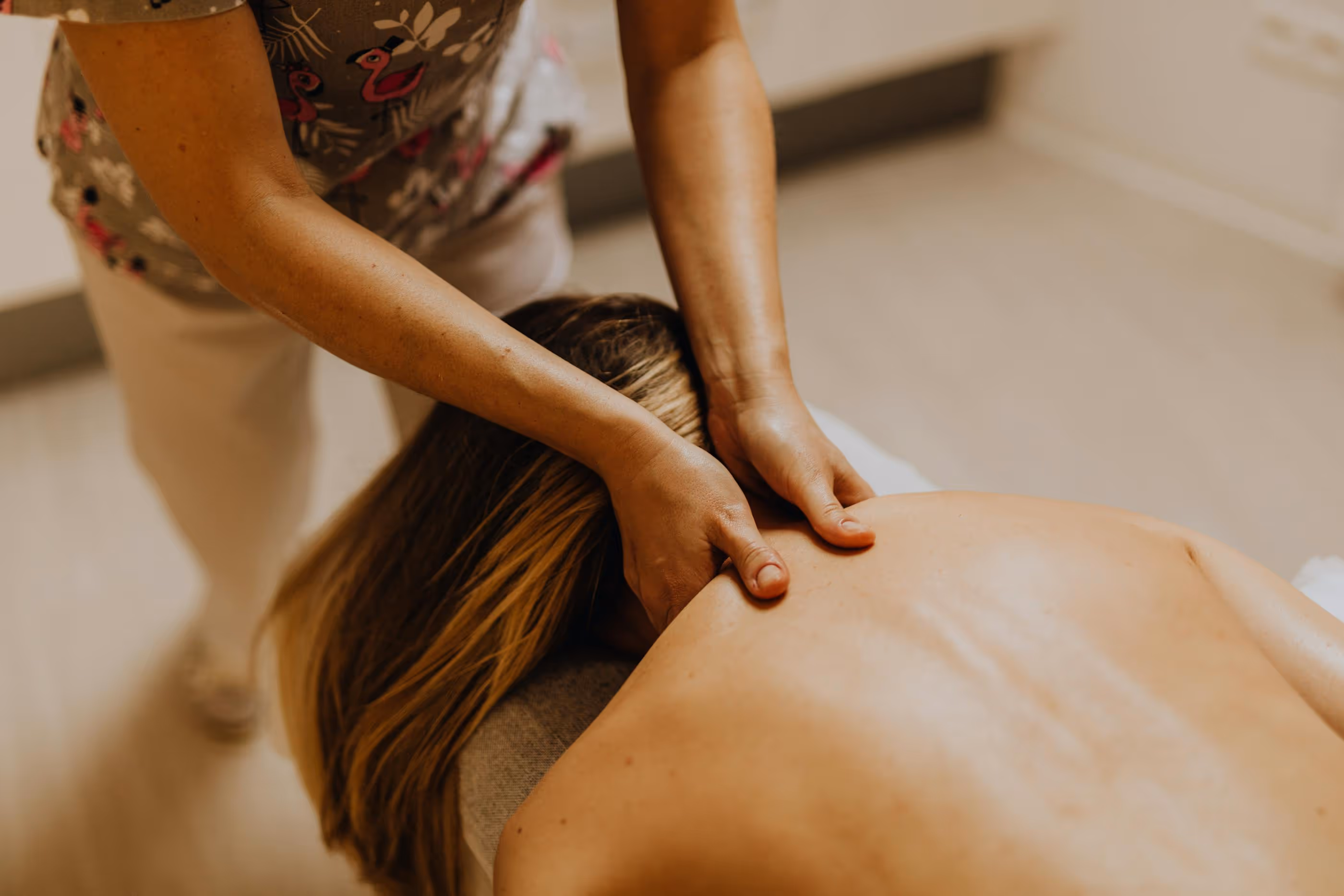 Person receiving a back massage