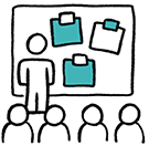 Person presenting sticky notes to a group