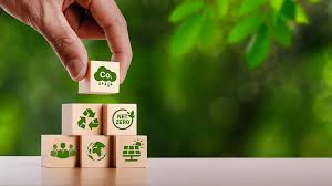 Hand stacking CO₂ block on eco icons blocks