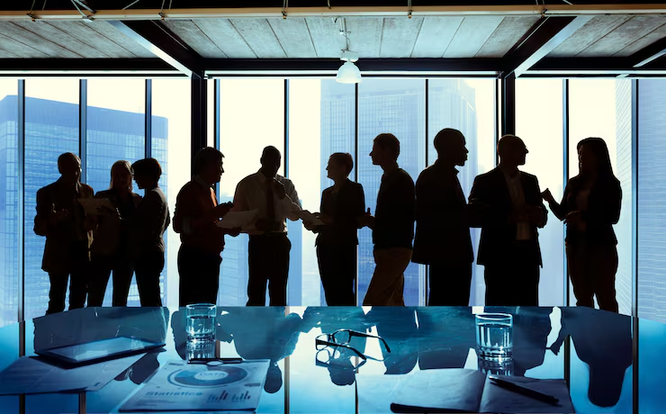 Business team meeting in a modern office with city views