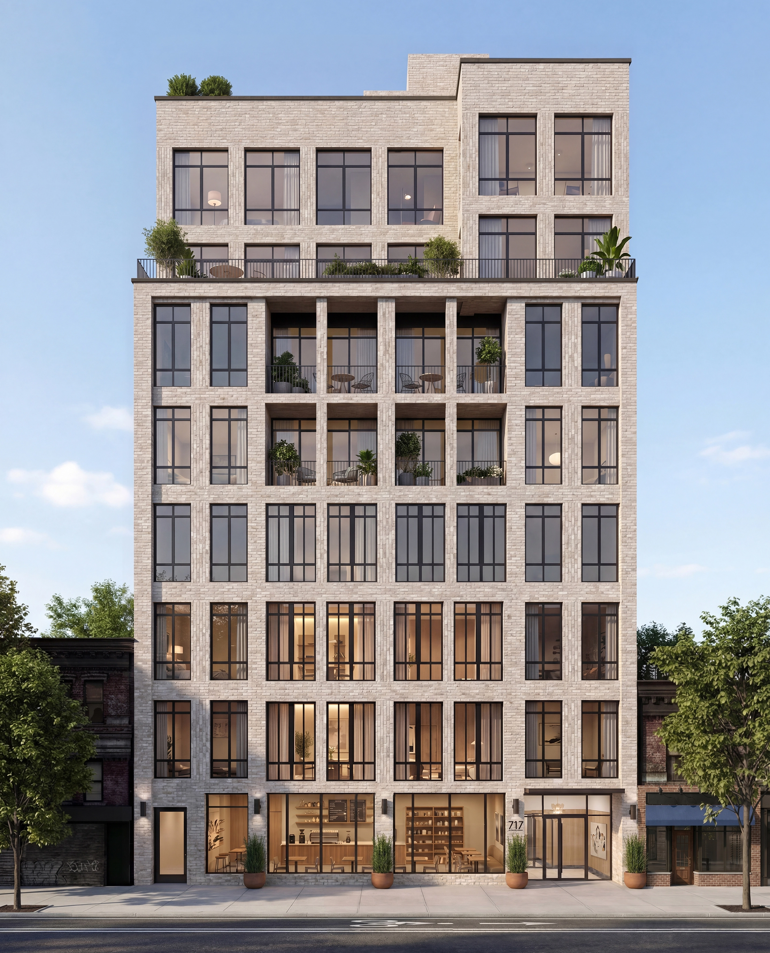 Photo-realistic CGI rendering of 717 Grand — frontal elevation, brick + glass facade, daytime, cyclist passing