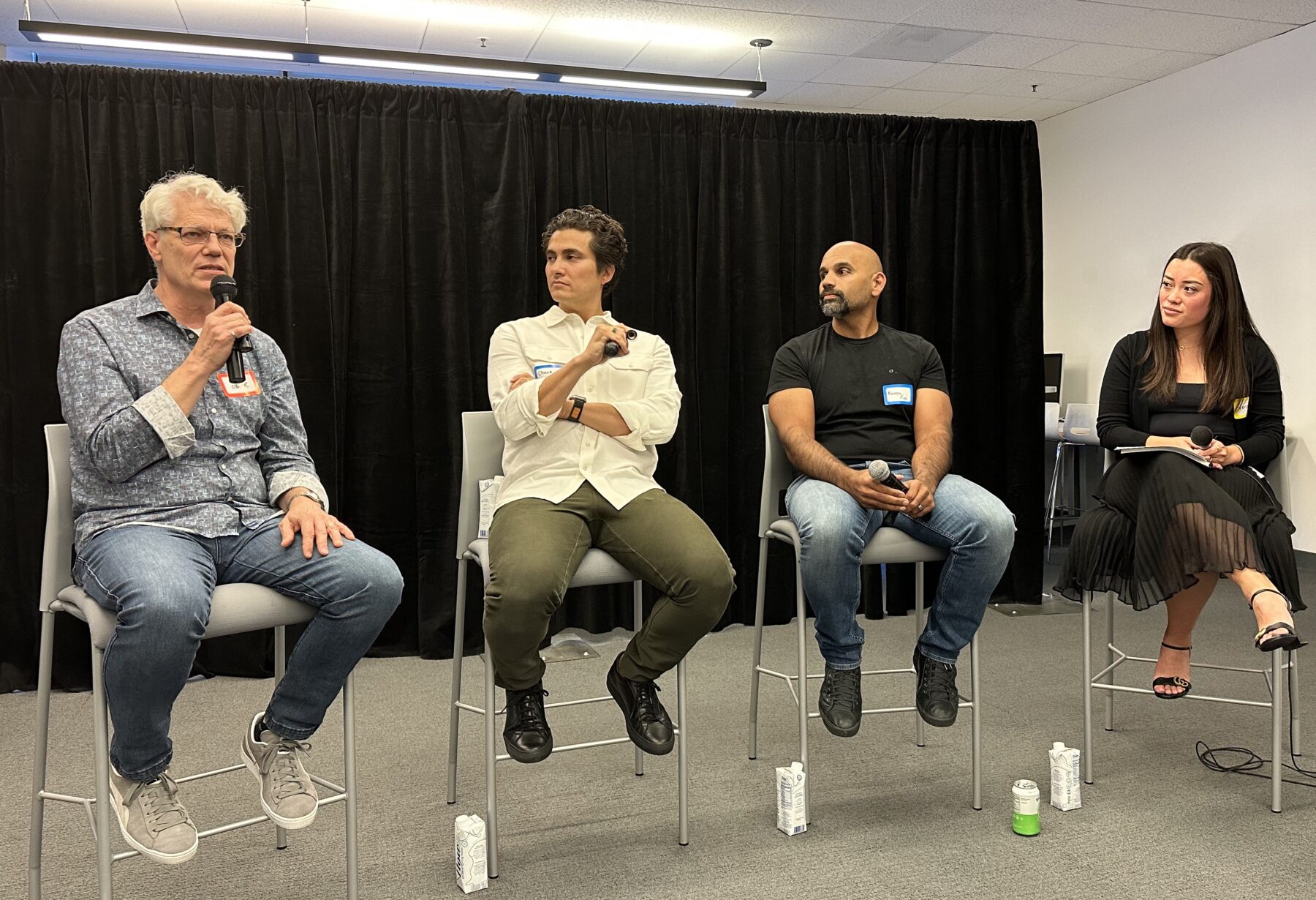 A photo of the panelists on stage at SignalFire