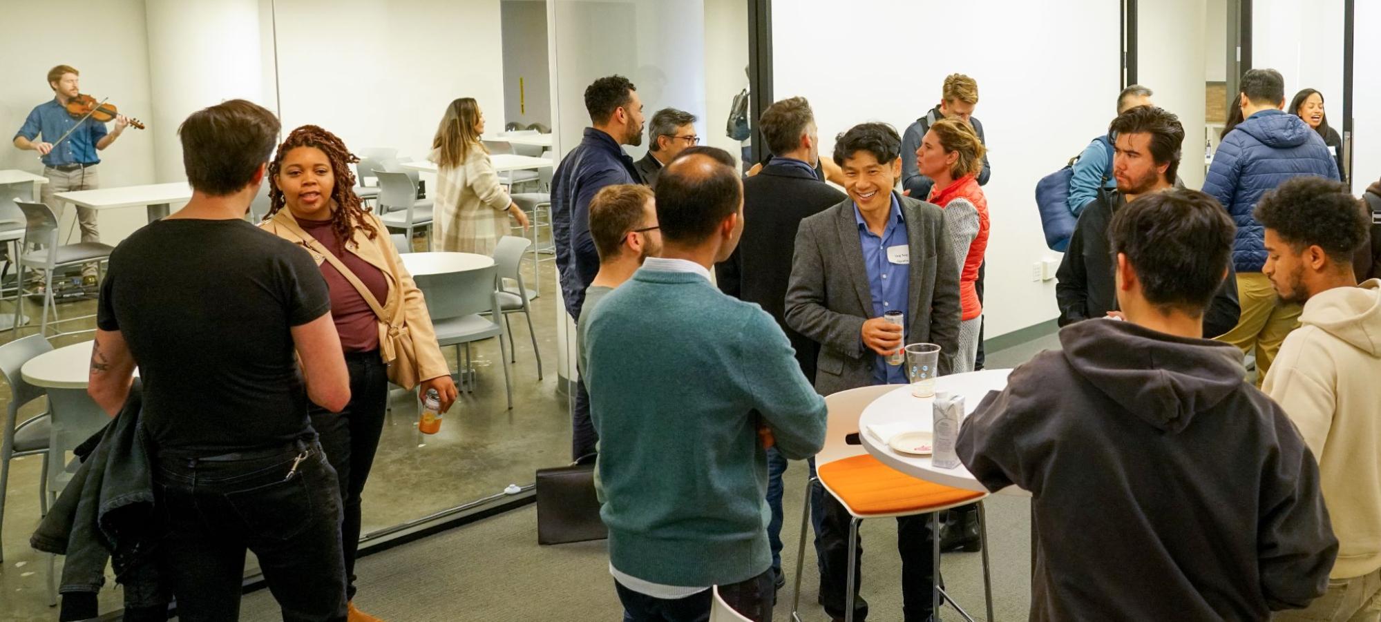 A group of people gathered in the SignalFire offices