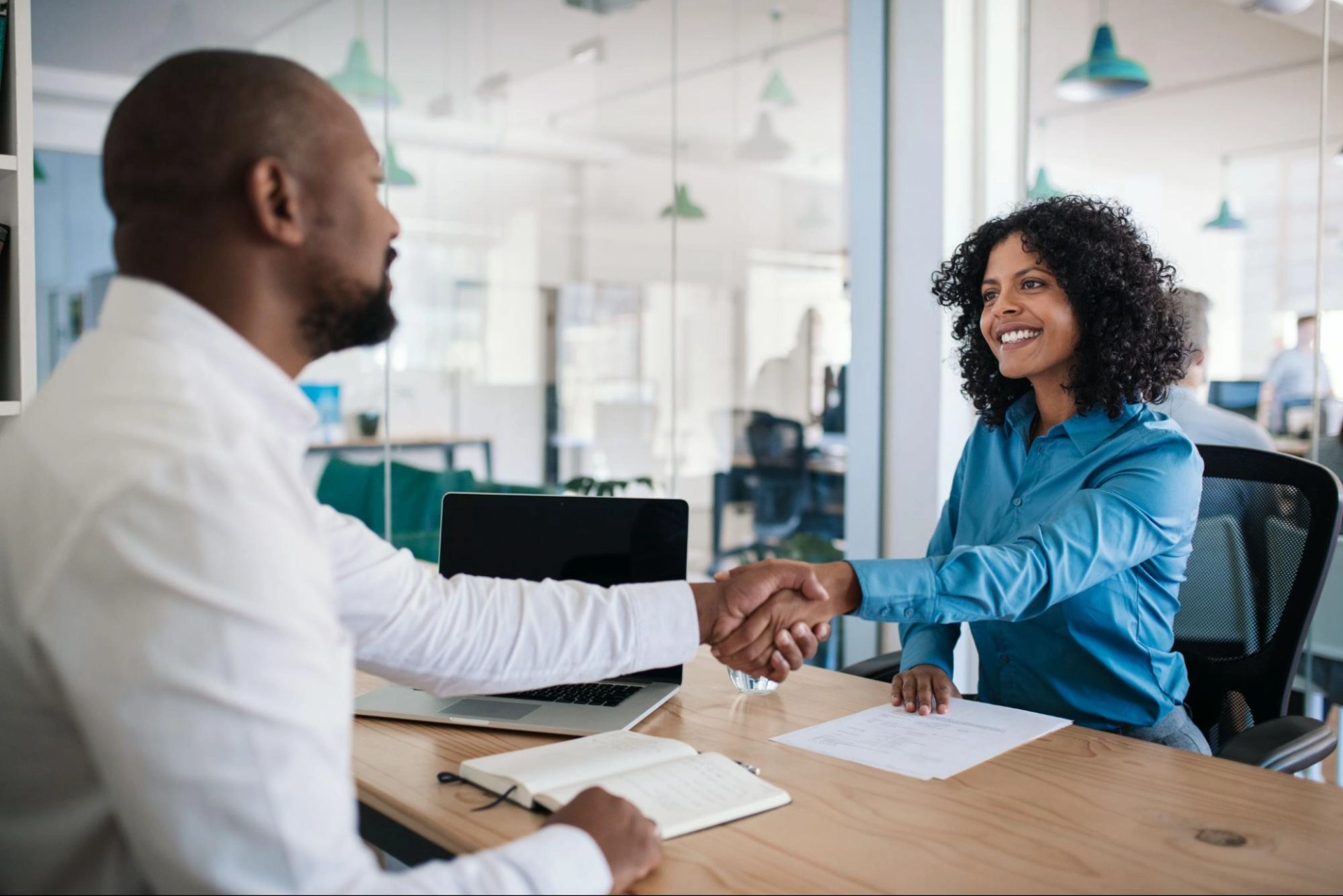 Employee shaking hands with new employer