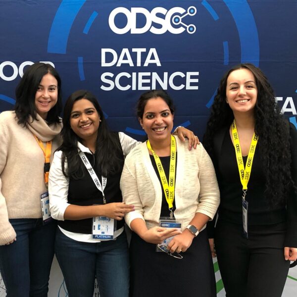 Image of Oana and friends at the open data science conference.