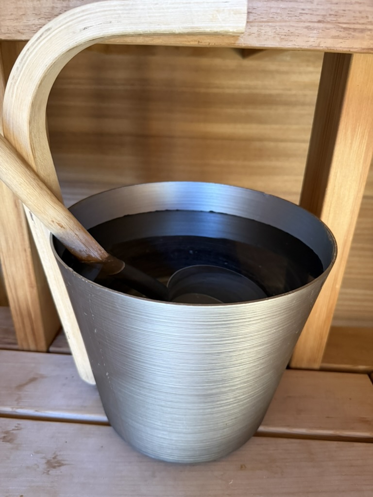 Wooden sauna bucket close-up