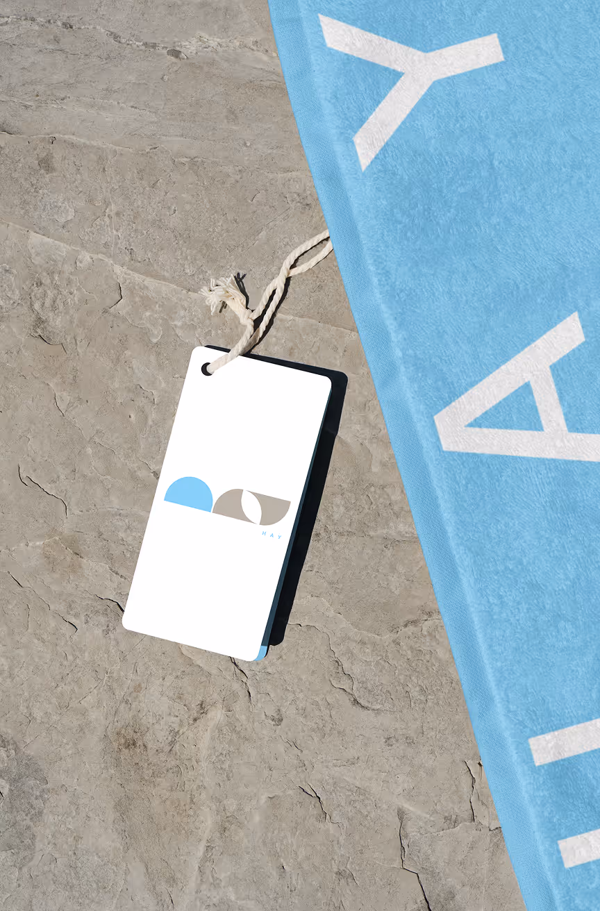 
beach-towel tag hay
