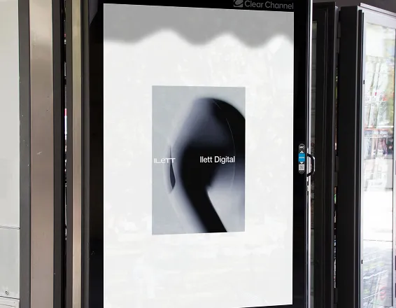 Ilett Digital poster in a street window