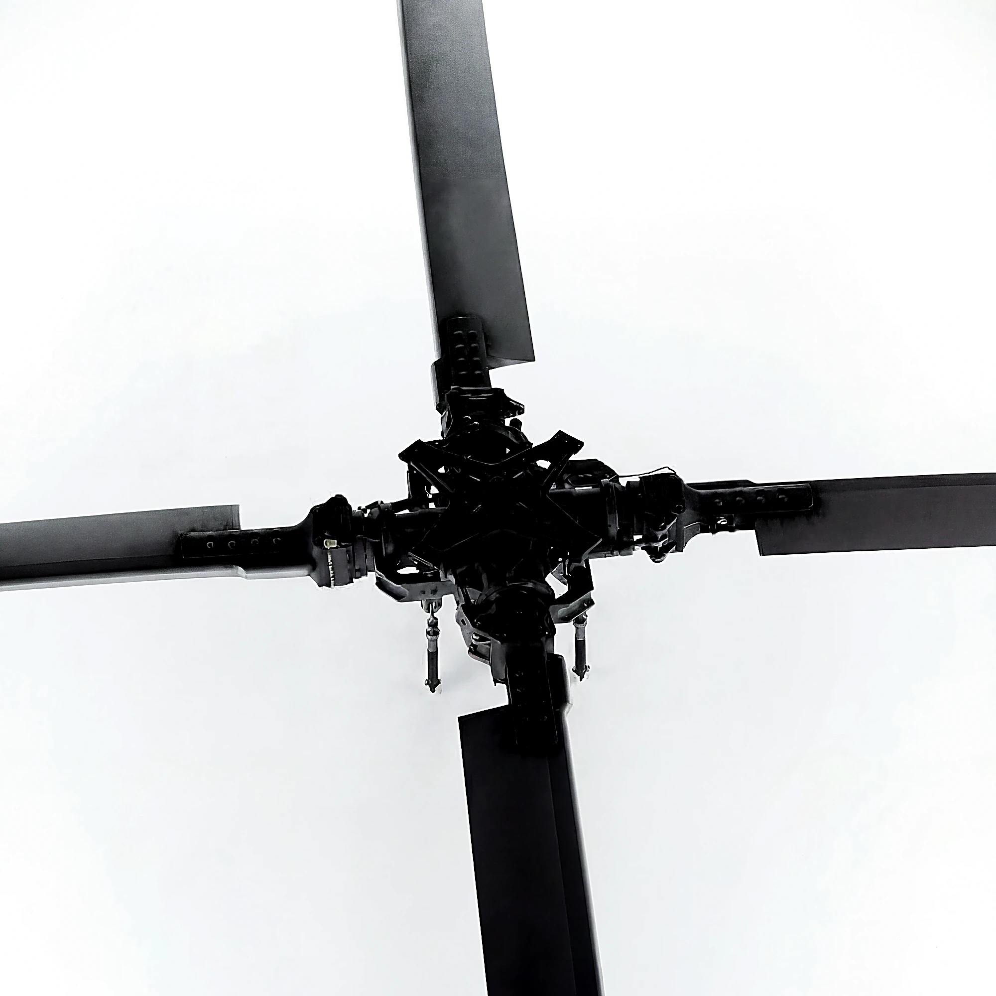 Helicopter rotor blades against a white sky