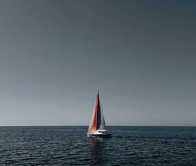 Sailboat alone on open water
