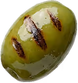 Close-up of a green olive with three grill marks on its surface.