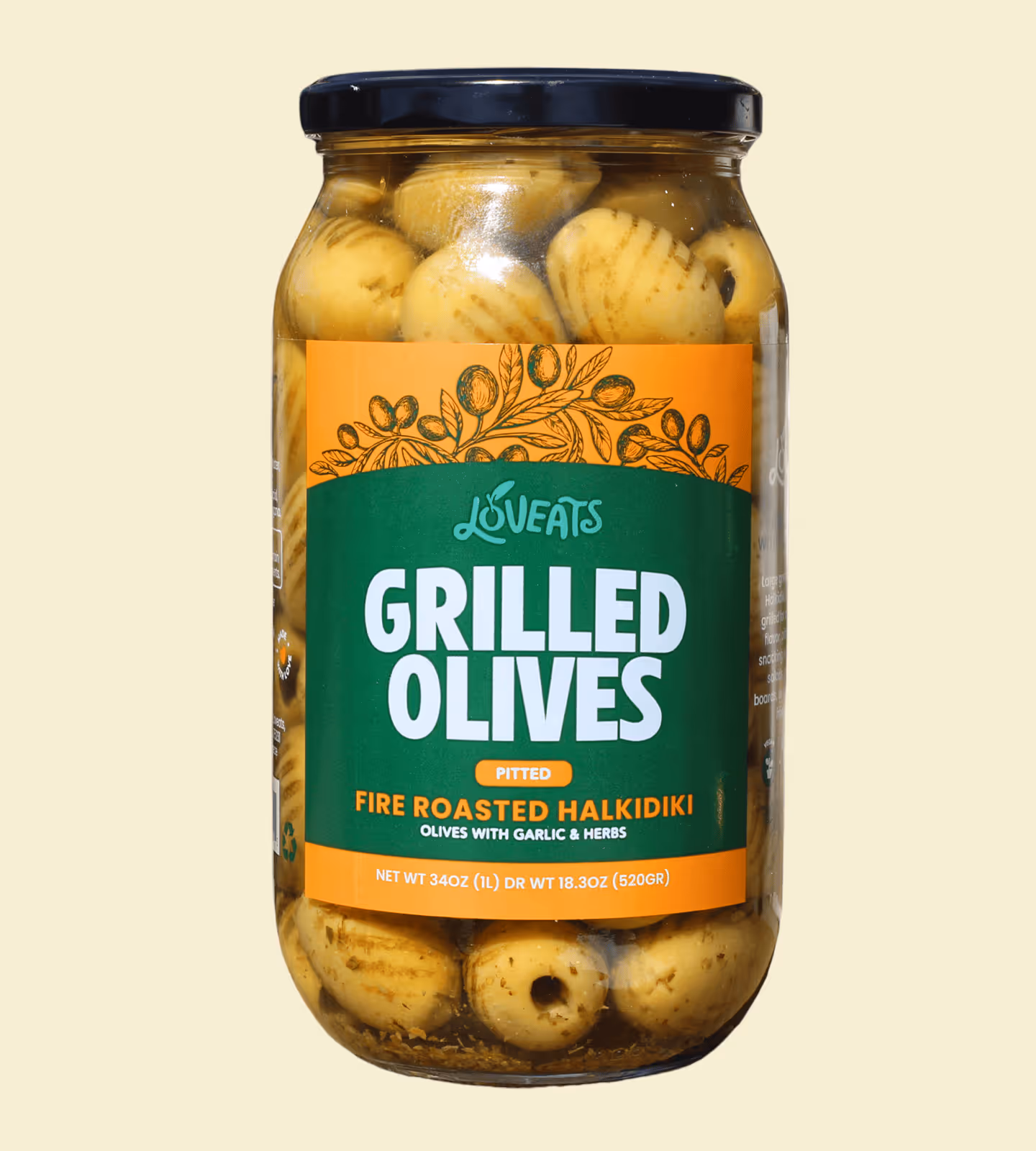 Jar of Loveats grilled pitted fire roasted Halkidiki olives with garlic and herbs.