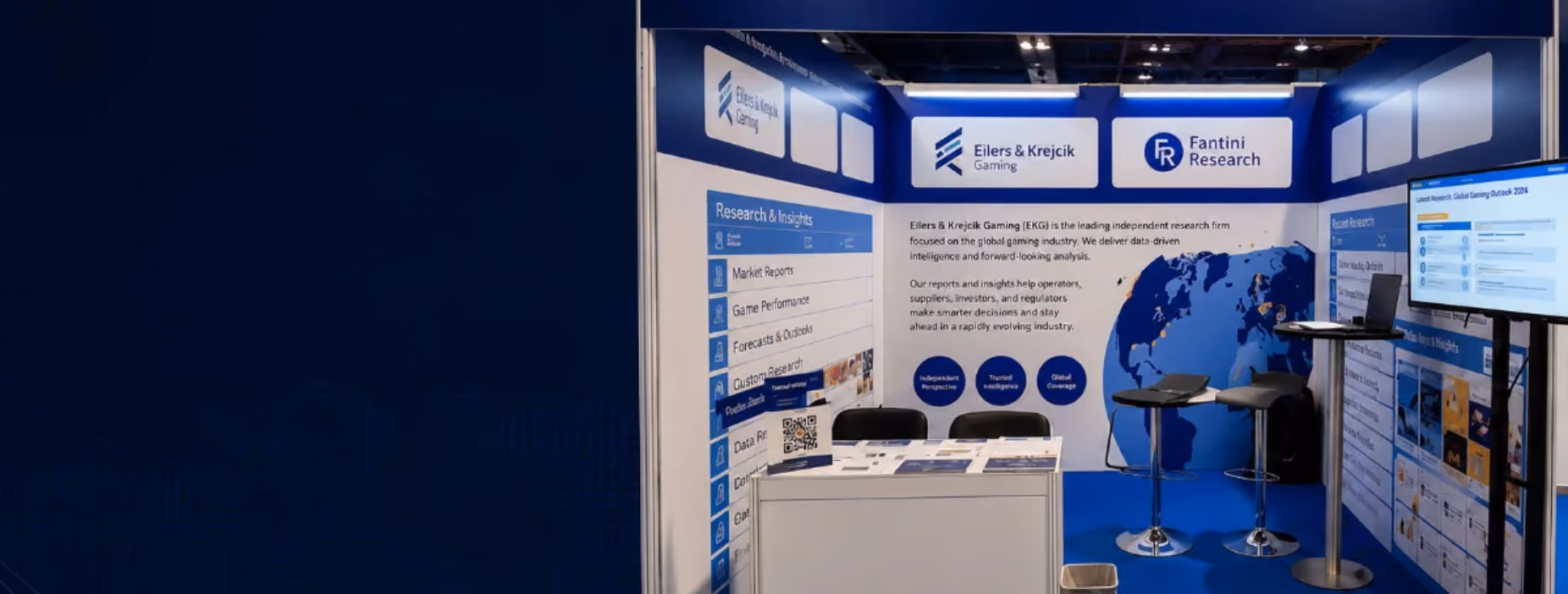Exhibition booth for Eilers & Krejcik Gaming featuring research info, a world map, and a monitor with data.