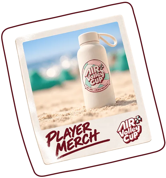 White water bottle with an Air Volley Cup logo placed upright on sand at a beach, with blurred blue sky and sea in the background, framed as a tilted Polaroid-style image captioned 'Player Merch' and Air Volley Cup logo.
