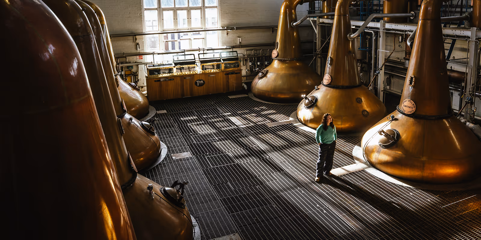 Distillery manager Polly inside Tormore stillhouse