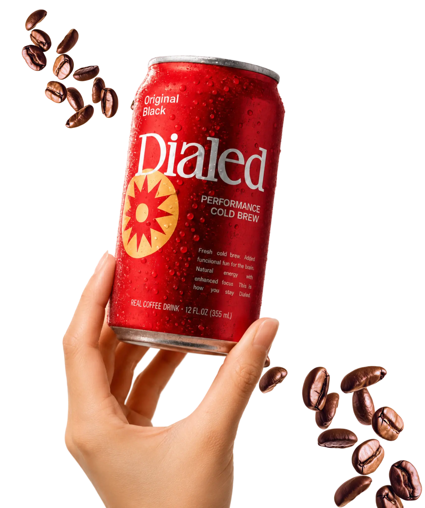 Hand holding a red can of Dialed Original Black performance cold brew coffee with coffee beans nearby.