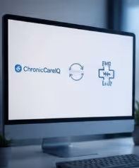 Computer screen showing ChronicCareIQ logo, synchronization icon, and a medical cross symbol.