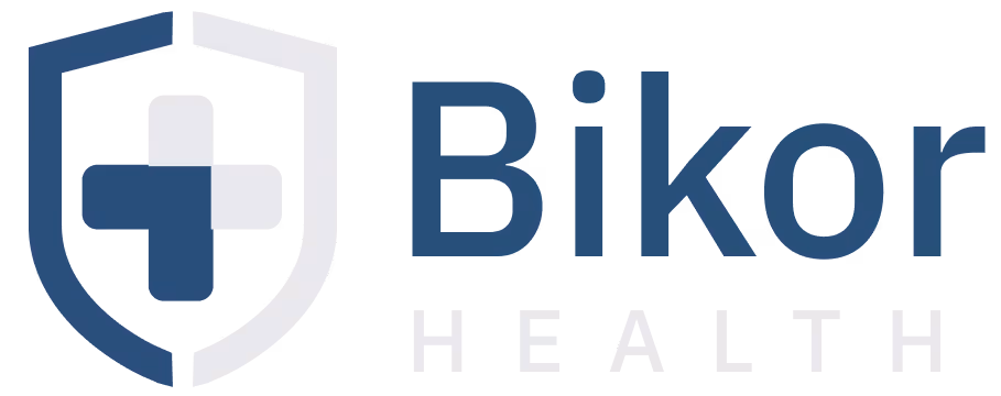 Bikor Health logo with a shield and cross design in blue and white beside the company name.