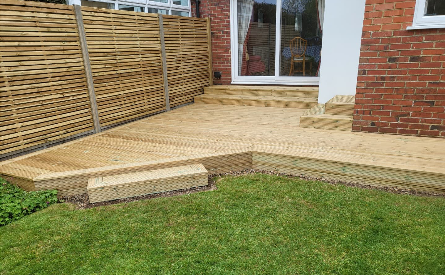 Newly installed garden decking after professional installation in Worthing, West Sussex