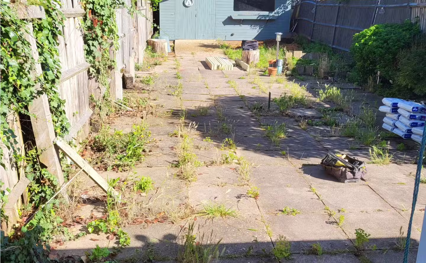 Bare garden before patio and turfing installation in Worthing, West Sussex