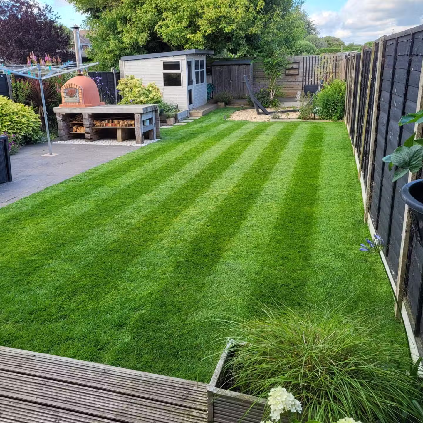 Beautifully maintained and freshly mowed lawn in Worthing by Casteldine Landscapes