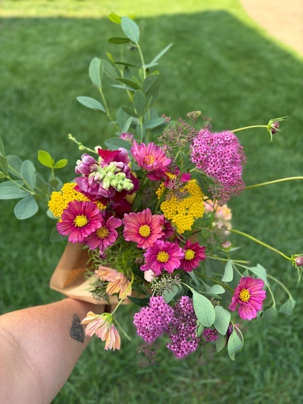 Summer sample bouquet with cosmos, snapdragons, yarrow, and spirea