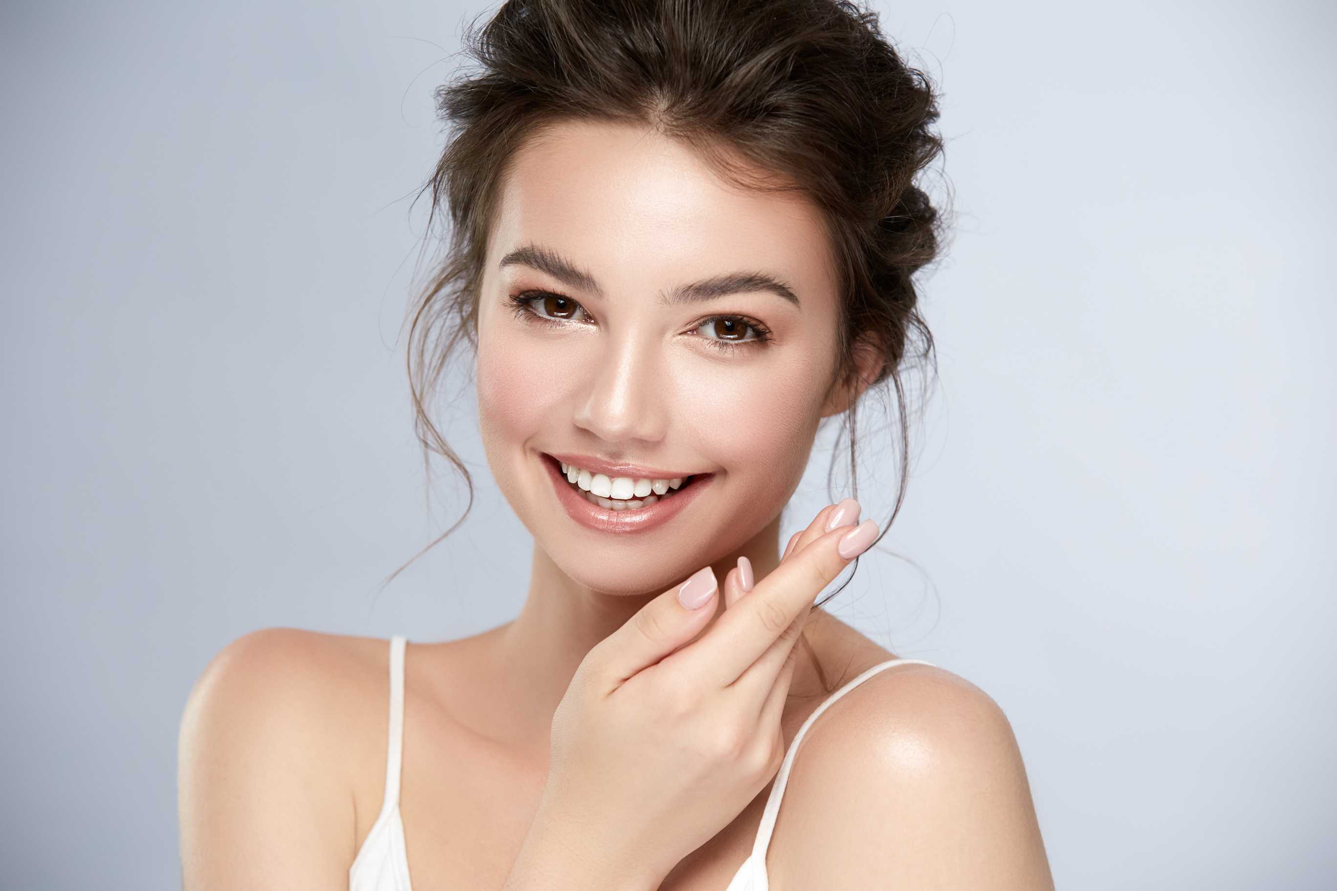 happy woman smiling at camera