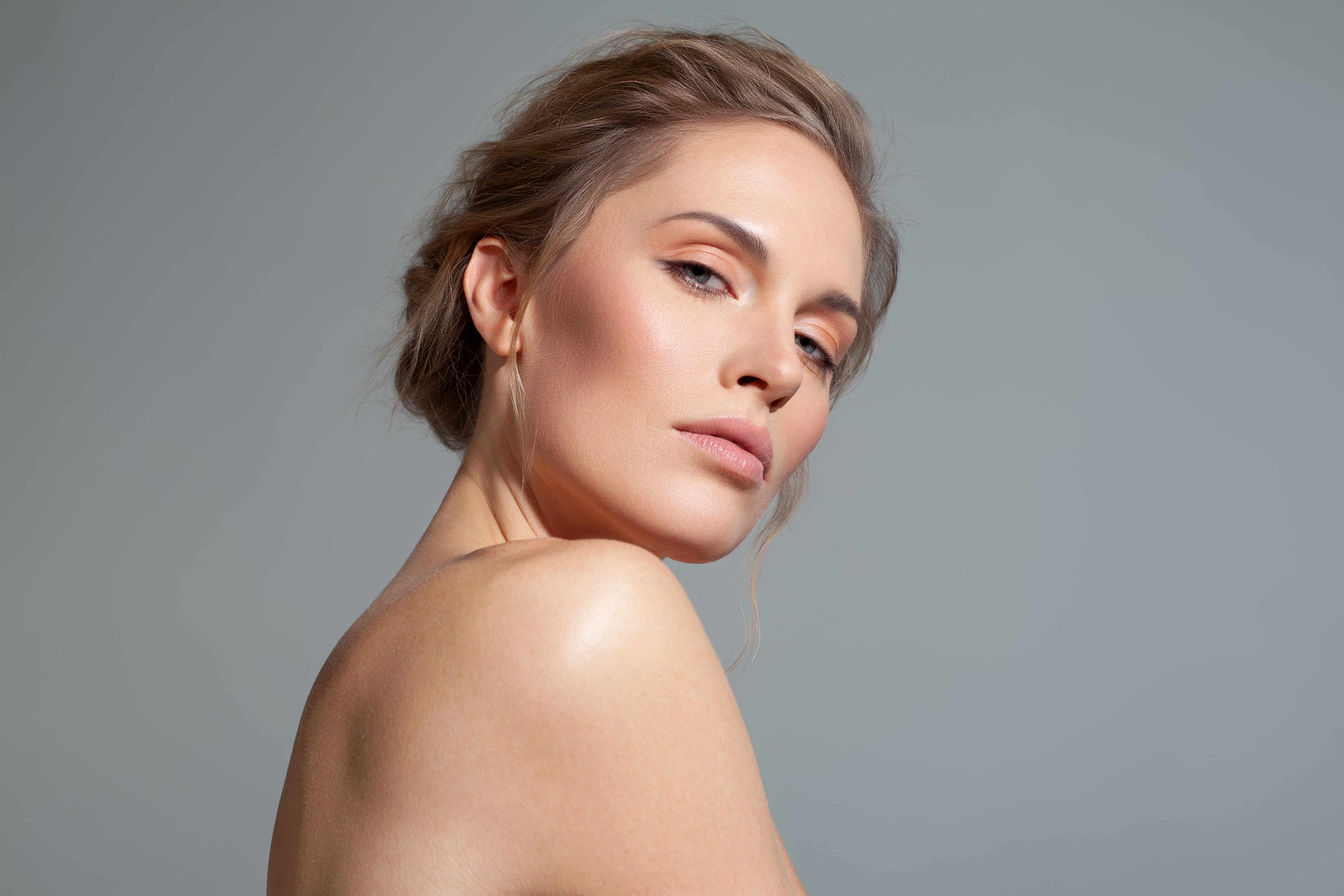 beautiful woman looking down at camera