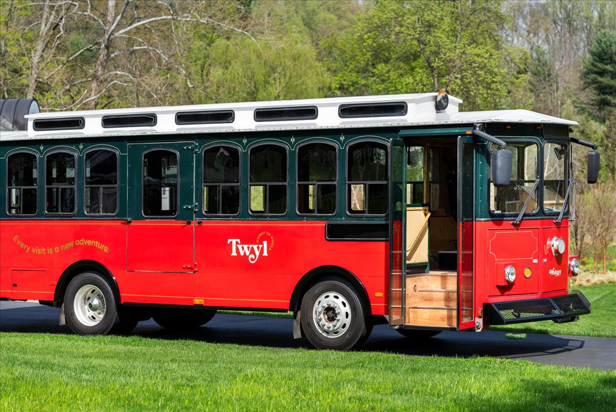 A side view of the Twyl trolley parked